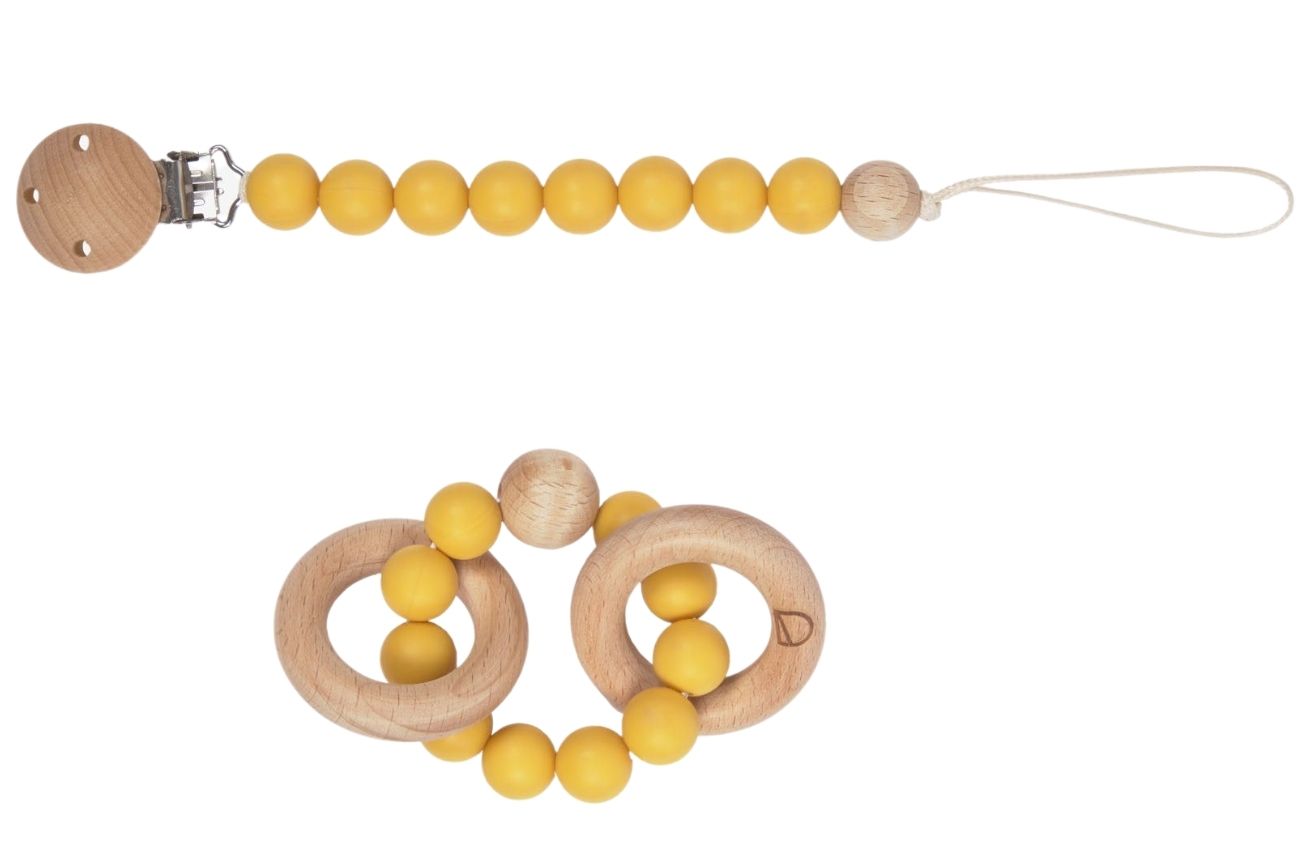 Set hořčicově žlutého silikonového kousátka a klipu na dudlík Kave Home Epiphany Kave Home
