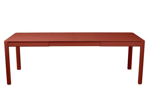 Zemitě červený kovový rozkládací zahradní stůl Fermob Ribambelle 149/234 x 100 cm Fermob
